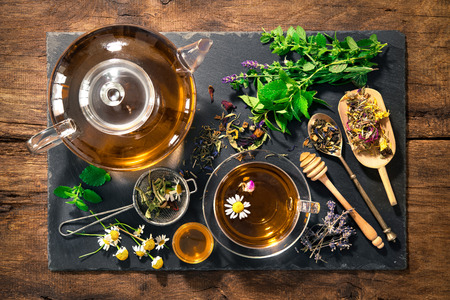 Cup of herbal tea with honey