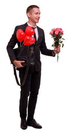 片手に笑顔の男は 白い孤立した背景に別の花束でボールを持つバッグを保持します の写真素材 画像素材 Image 片手に笑顔の男は 白い孤立した背景に別の花束でボールを持つバッグを保持します の写真素材 画像素材 Image