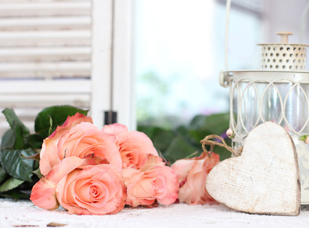 Peach flower: Beautiful bouquet of peach roses in shabby style on a mirror background