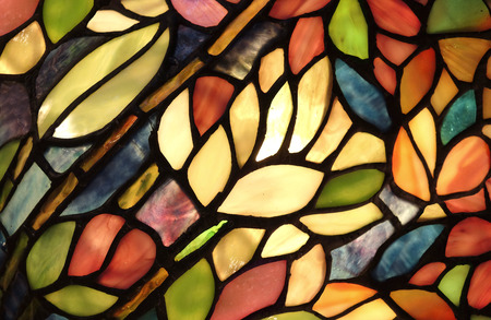 Glass art with backlit pattern in vibrant colors