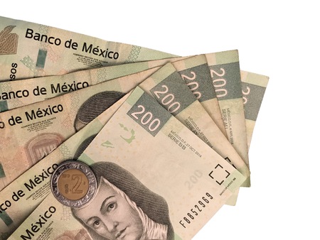 A bunch mexican peso 200 paper bills grouped and isolated on white background