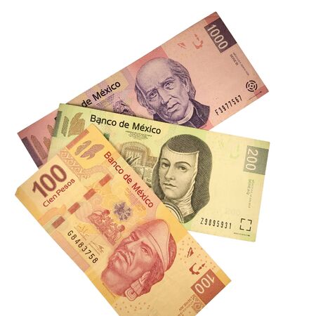 A group of 100 200 500 and 1000 mexican peso bills isolated on white background Stock Photo
