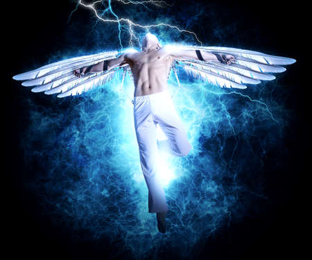 A man with wings on electricity light background. Design for cover book, poster - 93483691