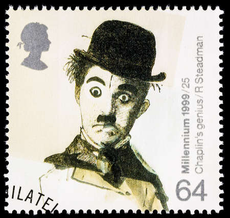 UNITED KINGDOM - CIRCA 1999: A used postage stamp printed in Britain celebrating Entertainers showing the Famous Film Star Charlie Chaplin