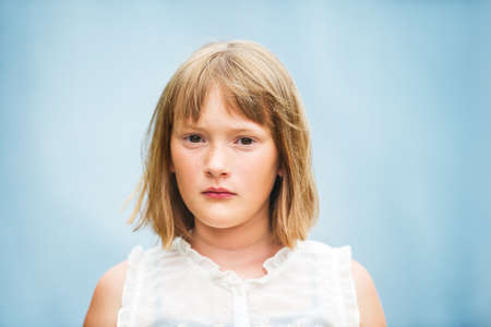 Close Up Portrait Of Sweet Little Girl With Short Bob