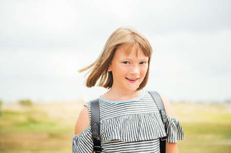 Close Up Portrait Of Sweet Little Girl With Short Bob