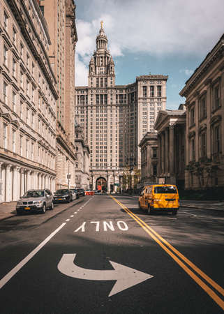 New york city hall and a taxi in manhattan