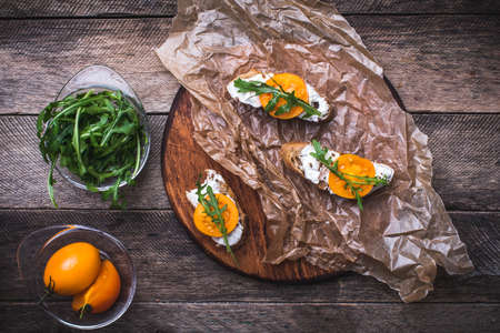 Bruschetta With Tomatoes And Arugula On Board In Rustic Style Food Photo Bruschetta With Tomatoes And Arugula On Board In Rustic Style Food Photo