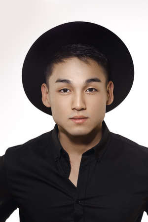 Close Up Portrait Of A Handsome Asian Man With Short Haircut