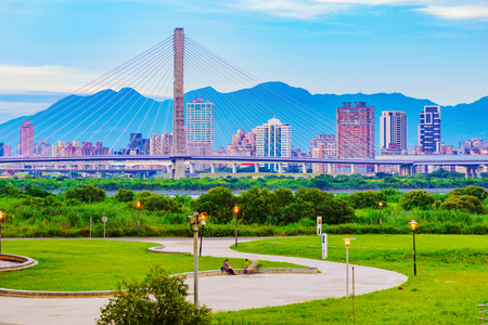 Taipei riverside park and city view in the evening Stock Photo