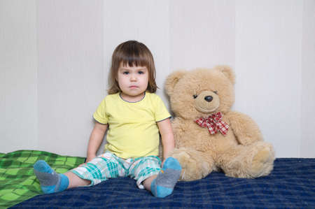 child and teddy bear