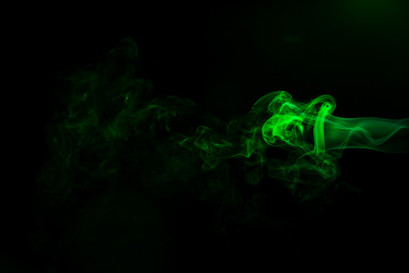 Green Coloured Smoke Abstract Lighting On A Black Background Stock