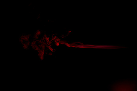 Red Smoke Abstract On Black Background Stock Photo Picture And