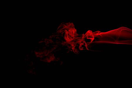 Red Smoke Abstract On Black Background Stock Photo Picture And