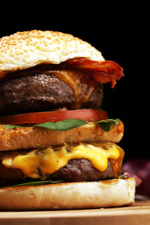 tasty fresh meat burgers with salad and cheese. homemade angus