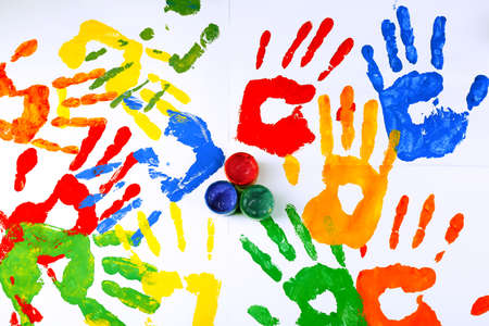 Hand prints of paint with paint on white background - 38033313