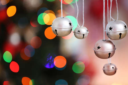 jingle bells on blurred christmas lights background closeup stock photo 96844384 - Blurred Christmas Lights jingle bells on blurred christmas lights background closeup stock photo 96844384 - Blurred Christmas Lights