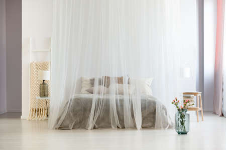 Modern Homely Bedroom Interior In Calm Neutral Colors With Canopy ... Modern Homely Bedroom Interior In Calm Neutral Colors With Canopy ...
