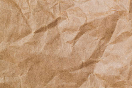背景紙くしゃくしゃに抽象的な茶色リサイクル 設計 装飾のための茶色の紙の折り目 の写真素材 画像素材 Image
