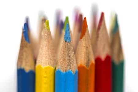 close up view at colored drawing pencils in a variety of colors