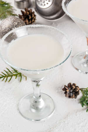 ideas and recipes for christmas drink white chocolate snowflake martini cocktail on white marble - White Christmas Martini Recipe ideas and recipes for christmas drink white chocolate snowflake martini cocktail on white marble - White Christmas Martini Recipe