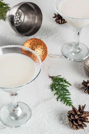ideas and recipes for christmas drink white chocolate snowflake martini cocktail on white marble - White Christmas Martini Recipe ideas and recipes for christmas drink white chocolate snowflake martini cocktail on white marble - White Christmas Martini Recipe