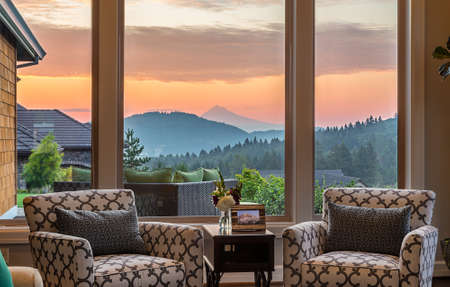 Gorgeous SunsetSunrise View from Living Room in New Luxury Home Фото со стока