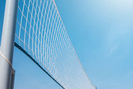 Mesh for beach volleyball on a sunny summer day Stok Fotoğraf