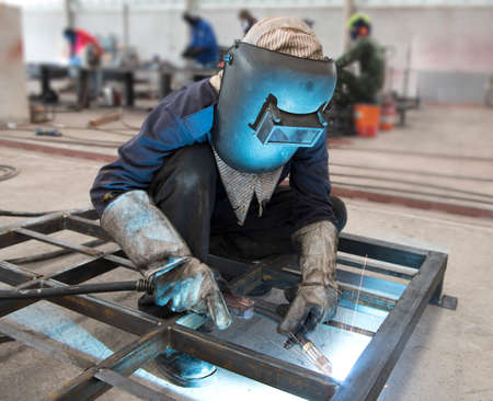 Welder in factory