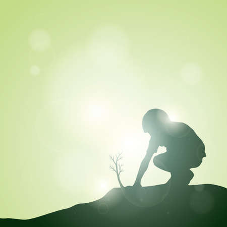 Silhouette of boy planting tree Stock Photo