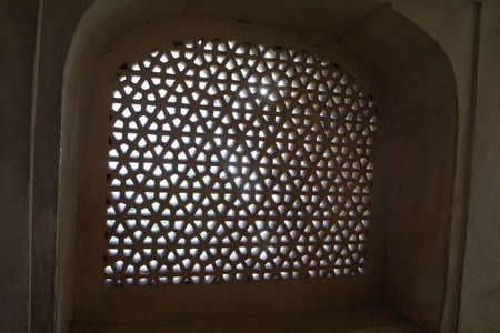 stone mosaic lattice window at amber fort near jaipur rajasthan