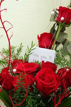 bouquet of roses with i love you card stock photo picture and