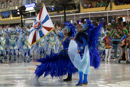 Rio, brazil - february 21, 2020: parade of the samba school vigario geral, at the marques de sapucai sambodromo. 1st master of ceremonies and flag bearer couple jefferson gomes e paulinha penteado Stock Photo