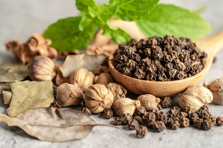 Black pepper and siam cardamom, amomum krervanh pierre, asia dried spices herb for drug and thai cooking for good health.