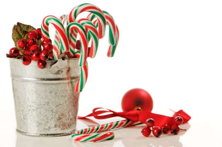bucket of festive christmas candy canes with decorations on white background stock photo 6006641 - Christmas Candy Decorations bucket of festive christmas candy canes with decorations on white background stock photo 6006641 - Christmas Candy Decorations