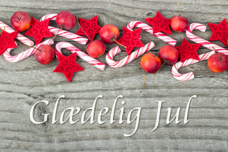 danish christmas card with candy canes apples and text merry christmas stock photo 34904389 - Merry Christmas In Danish danish christmas card with candy canes apples and text merry christmas stock photo 34904389 - Merry Christmas In Danish