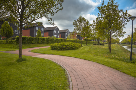 Row of Modern Middle Class Houses on an Ecological Managed Park with Selective Mowing Regime - 36108390