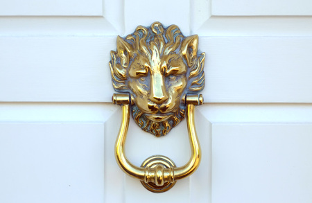 Old victorian brass lion head door knocker