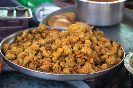 Bhajiya or Pakora is made with gram flour and spinach, This is the favorite street food of Indian and Pakistani people