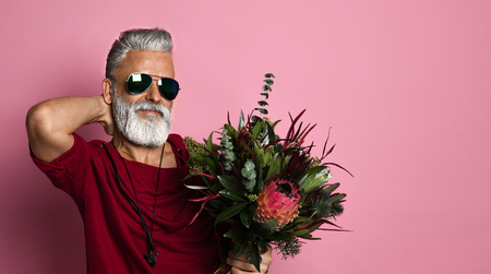 Stylish Bearded Middle Aged Man With A Modern Hairstyle And Fashionably
