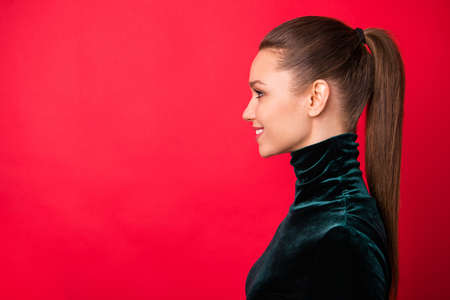 Close-up profile side view portrait of her she nice attractive winsome lovable charming cute cheerful cheery straight-haired lady copy space isolated over bright vivid shine red background