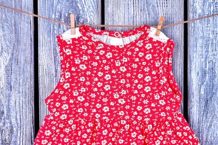 Infant Girl Sundress On Rope Baby Girl Casual Patterned Dress Drying On Clothesline On Infant Girl Sundress On Rope Baby Girl Casual Patterned Dress Drying On Clothesline On