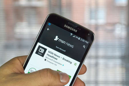 logo samsung: MONTREAL, CANADA - MARCH 20, 2016 - Microsoft MSN mobile applications on Samsung S5s screen. Microsoft is an American multinational technology company