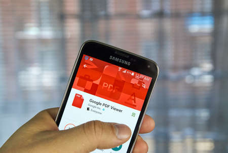 logo samsung: MONTREAL, CANADA - APRIL 7, 2016 : Google pdf viewer on a cell phone.