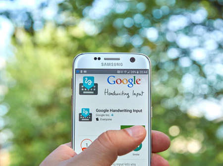 logo samsung: MONTREAL, CANADA - MAY 23, 2016 : Google Handwriting application on Samsung S7 screen. Google Handwriting Input allows users to handwrite text on a phone or tablet in 87 languages.