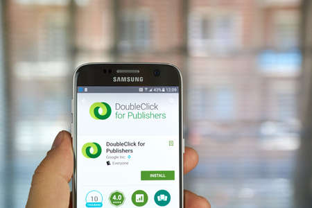 logo samsung: MONTREAL, CANADA - MAY 23, 2016 : Google DoubleClick for publishers application on Samsung S7 screen. DoubleClick offers publishers a complete ad revenue engine.