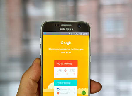 logo samsung: MONTREAL, CANADA - DECEMBER 23, 2016 : Google Flight page on Samsung S7 screen.