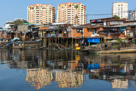 The landscape of Saigon: Views of the citys Slums from the river. Ho Chi Minh City, Vietnam.