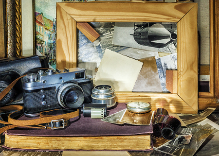Composition Of Vintage Objects On The Background Old Photographs And Wooden Frames For Paintings Photo Composition Of Vintage Objects On The Background Old Photographs And Wooden Frames For Paintings Photo