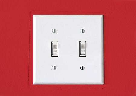 Double Light Switch On Red Wall Stock Photo Picture And